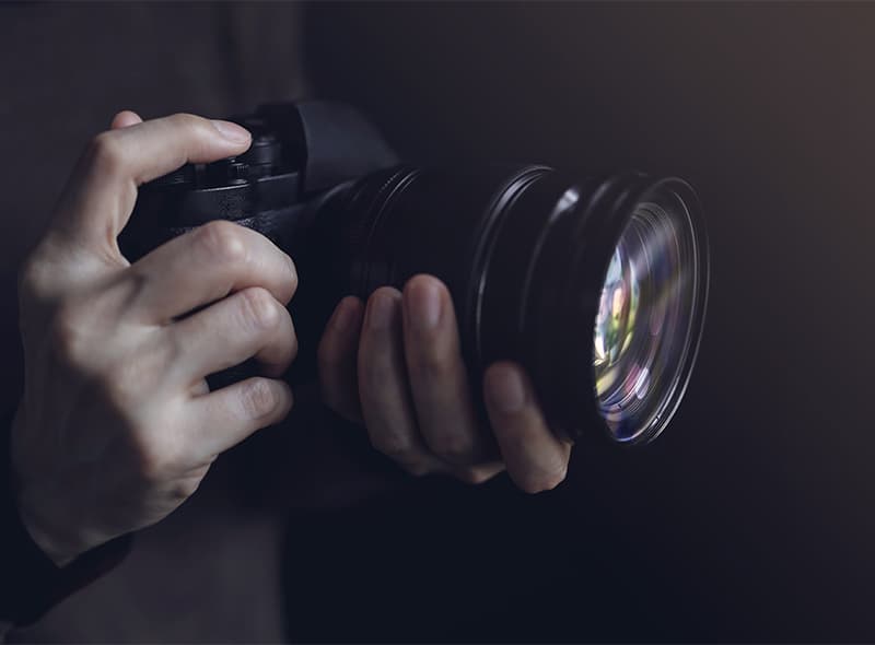 Investigator holding a camera