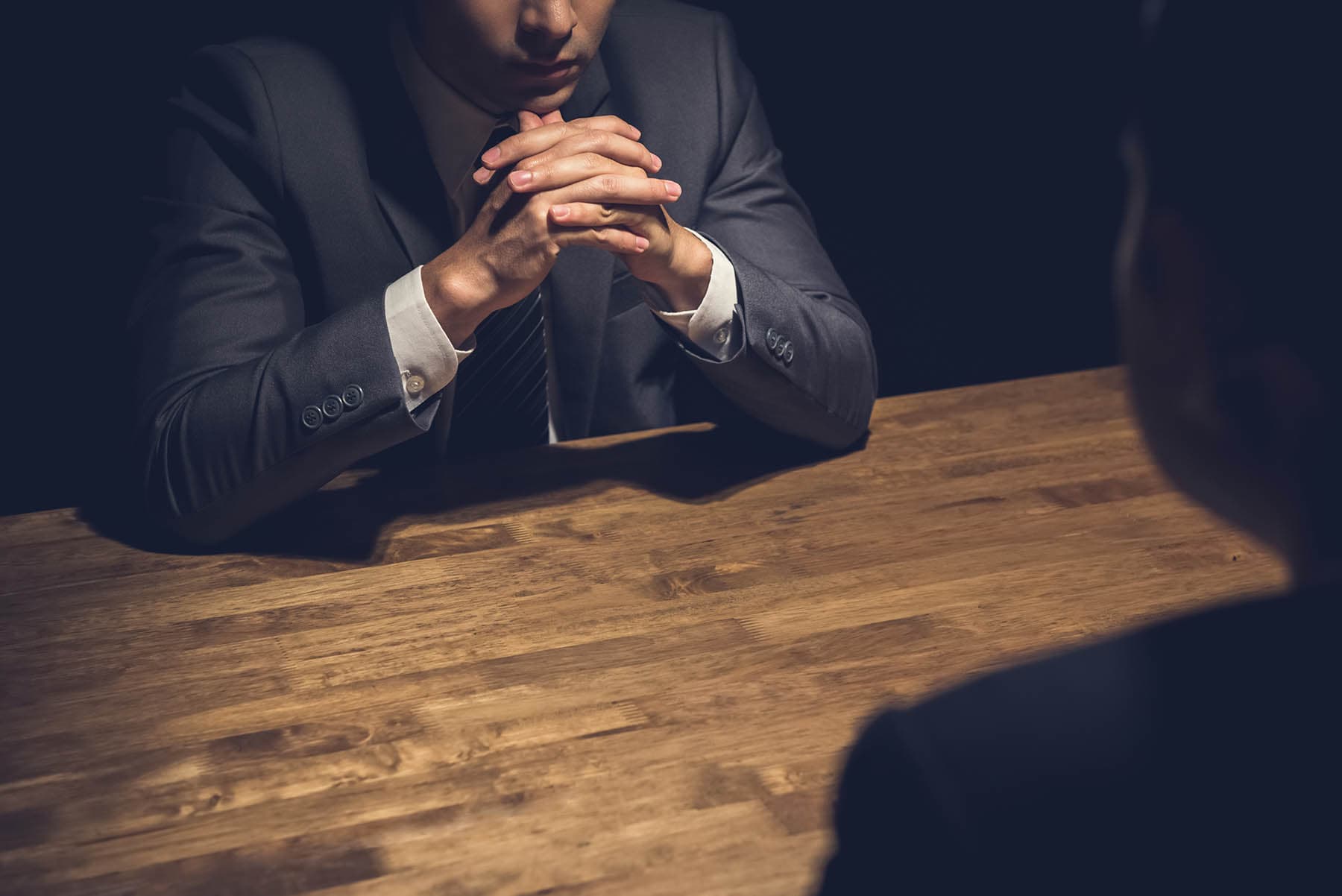 Private investigator interviewing a subject
