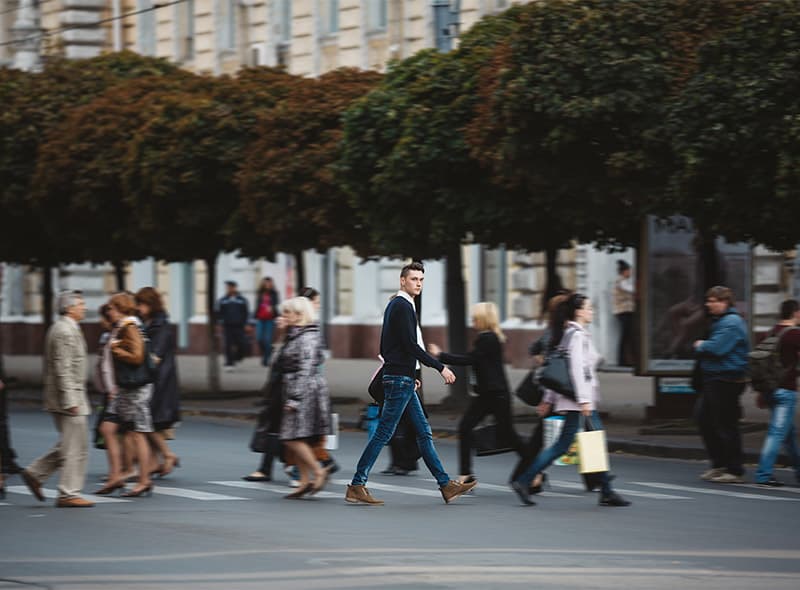 Pedestrians crossing a city street