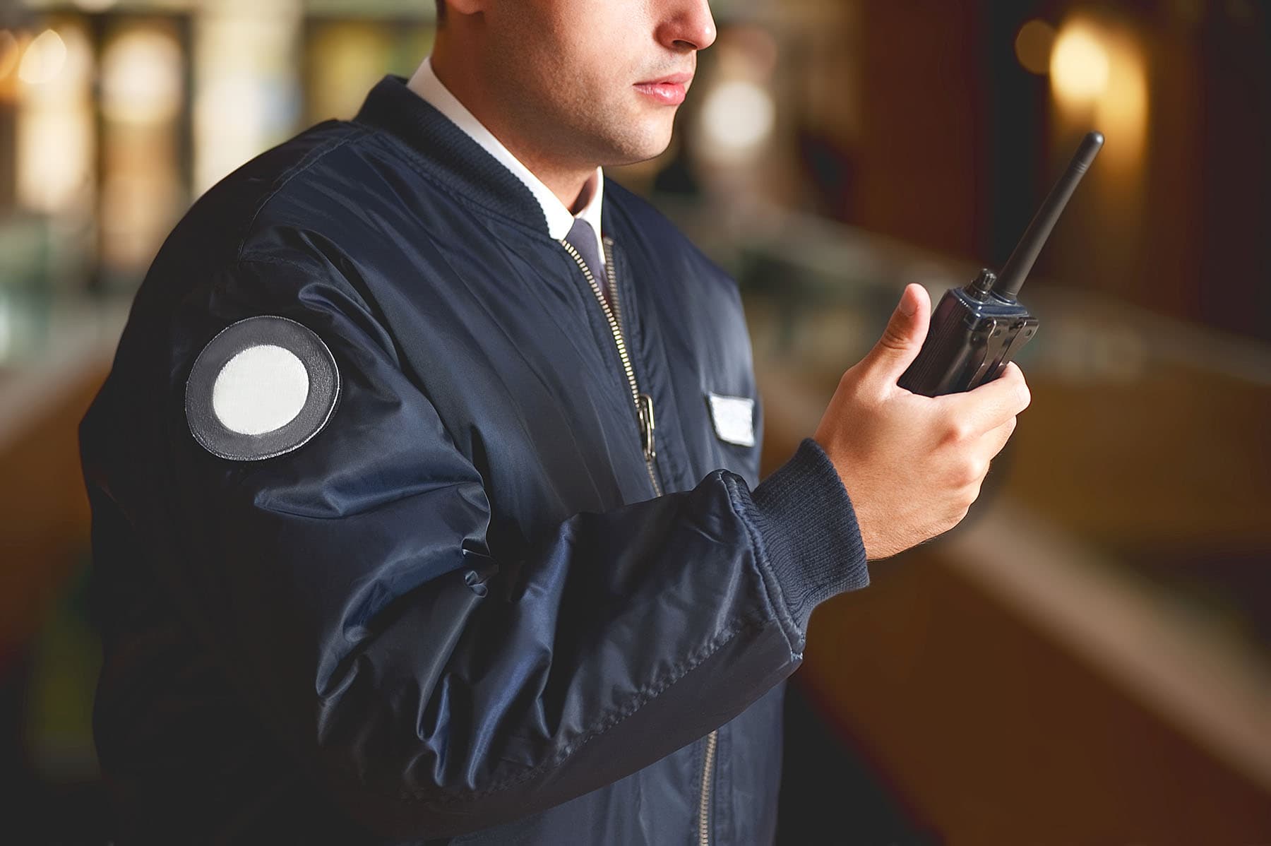 Security professional using a radio