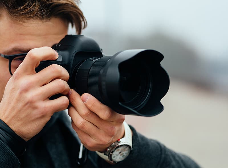 Investigator using a professional camera